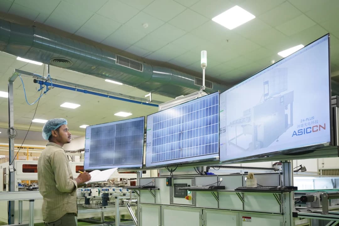 Shweta Solar operator reviewing EL crack-inspection scans of solar modules